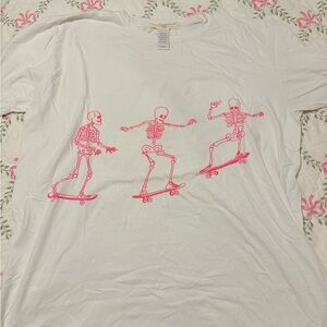 Project Social T White Tee with Pink Skeleton Skateboard Design